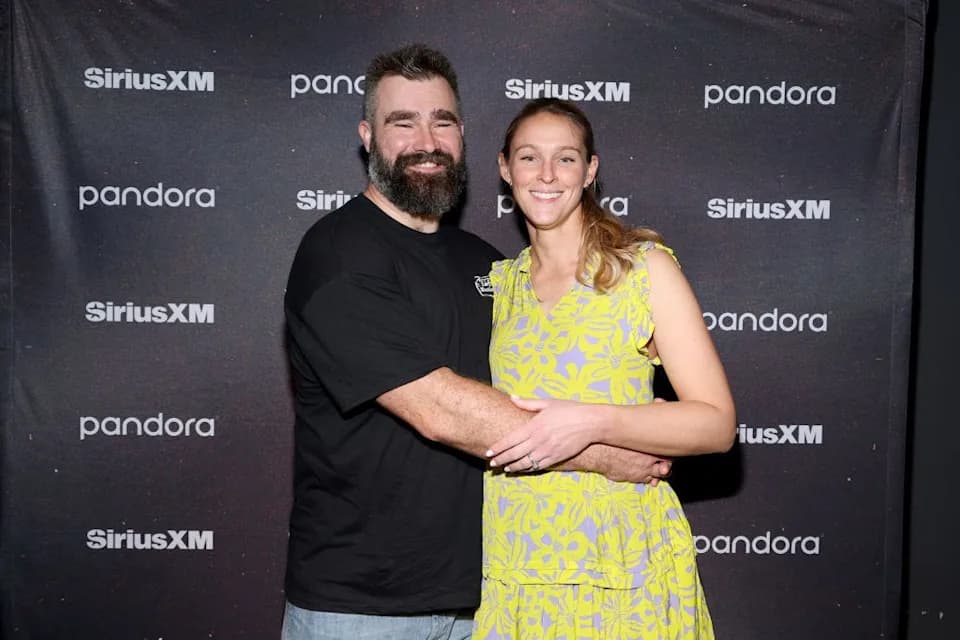 Kylie Kelce and Jason Kelce embracing at an event
