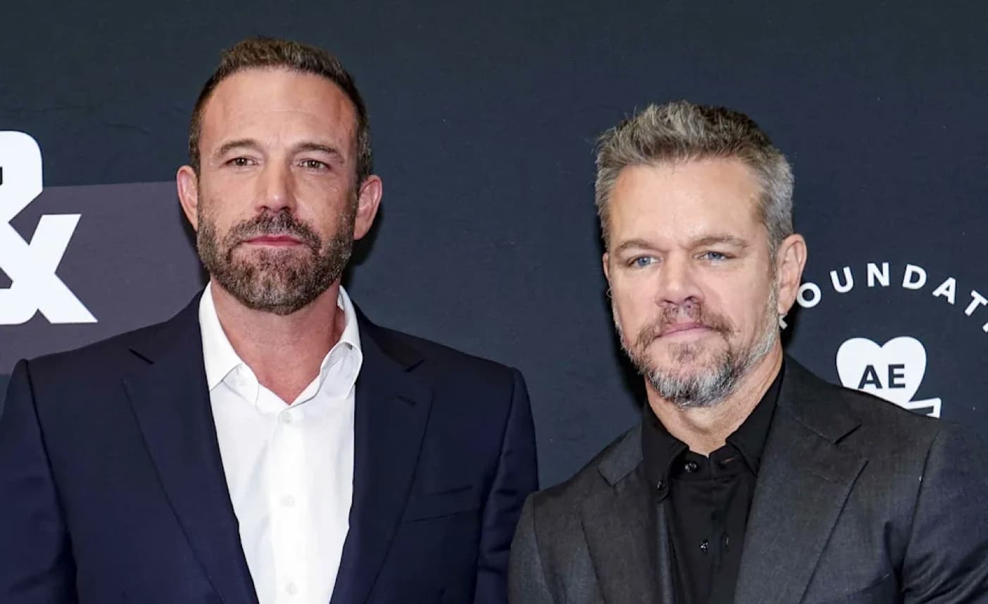 Ben Affleck and Matt Damon standing together at a red carpet event