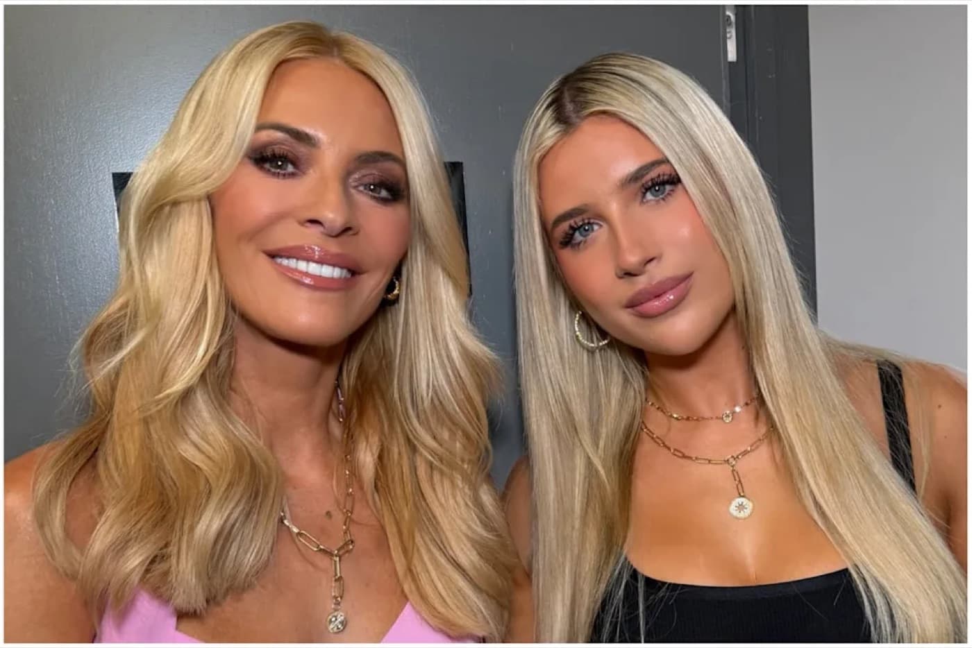 Tess Daly smiling next to her daughter Phoebe Kay, both with long blonde hair