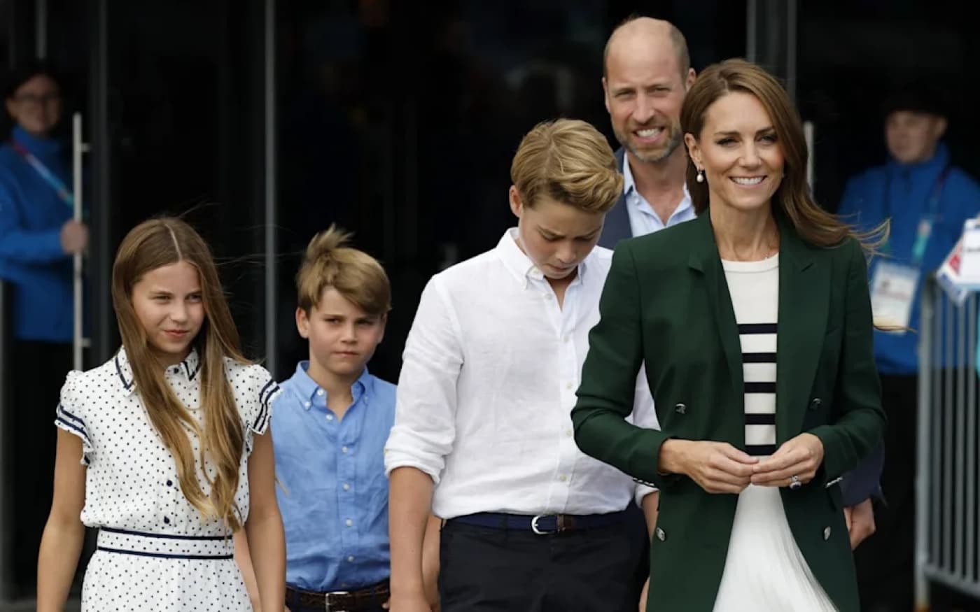 The Princess of Wales walking with Prince William and their three children at the Commonwealth Games