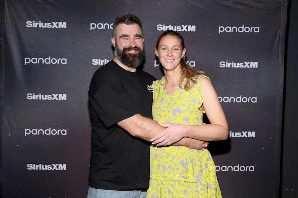 Kylie Kelce and Jason Kelce embracing at an event